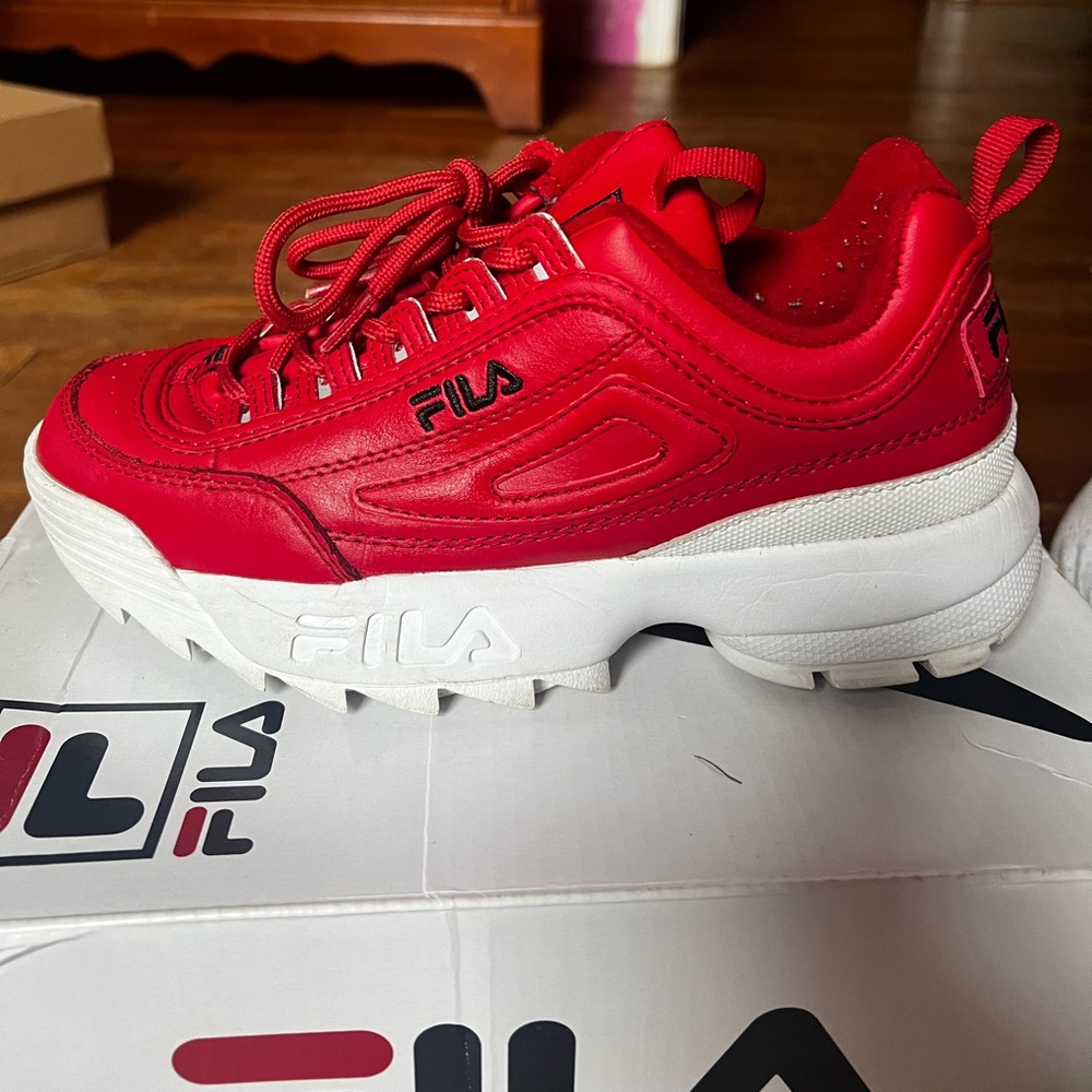 Selling red Fila sneakers in a women’s size 8